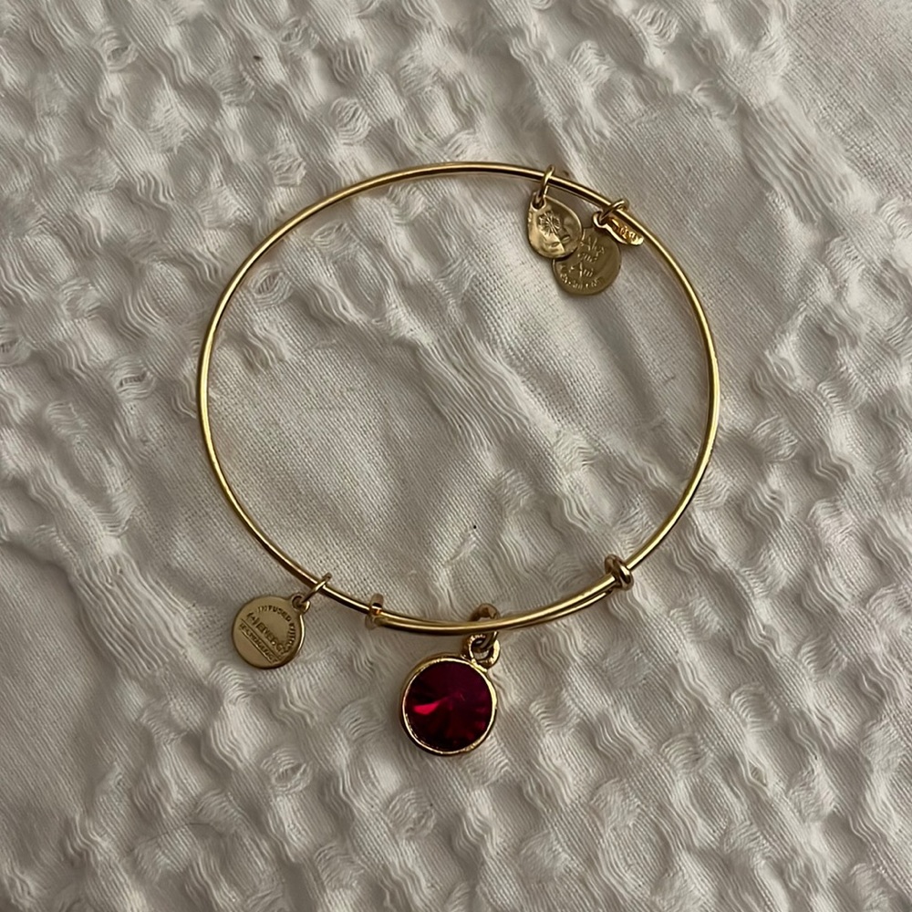 Alex & Ani gold bracelet with maroon gem